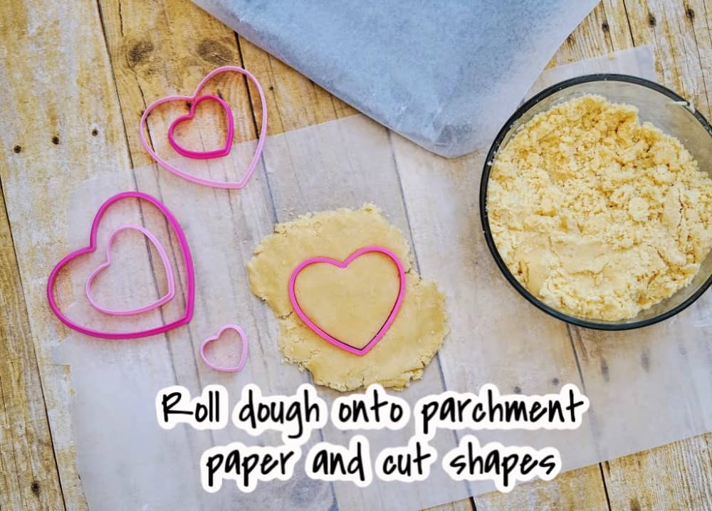 cutting out shapes for cookies