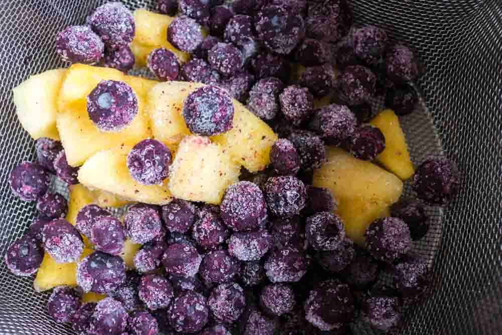 Instant Pot Pineapple Blueberry Fruit Infused Water Recipe- Making Fruit Infused Water in your Instant Pot has never been easier! The combination of pineapple and blueberry is incredible and refreshing. #infusedwater #instantpot #pressurecooker #blueberry #pineapple #easy #best #delicious #homefreshideas