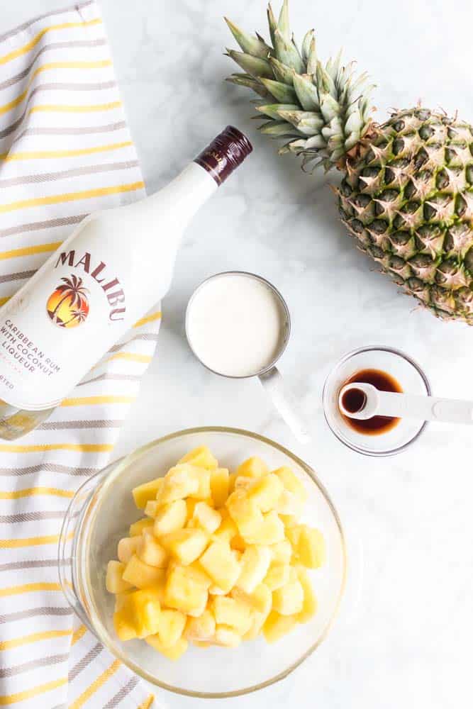 Slushy pineapple rum drink- This Slushy Pineapple Rum Drink Recipe is so easy and is sure to be the life of the party. The flavor is tropical and delicious!
#pineapple #tropical #rum #malibu #sweet #cocktail easy 
#delicious #homefreshideas 