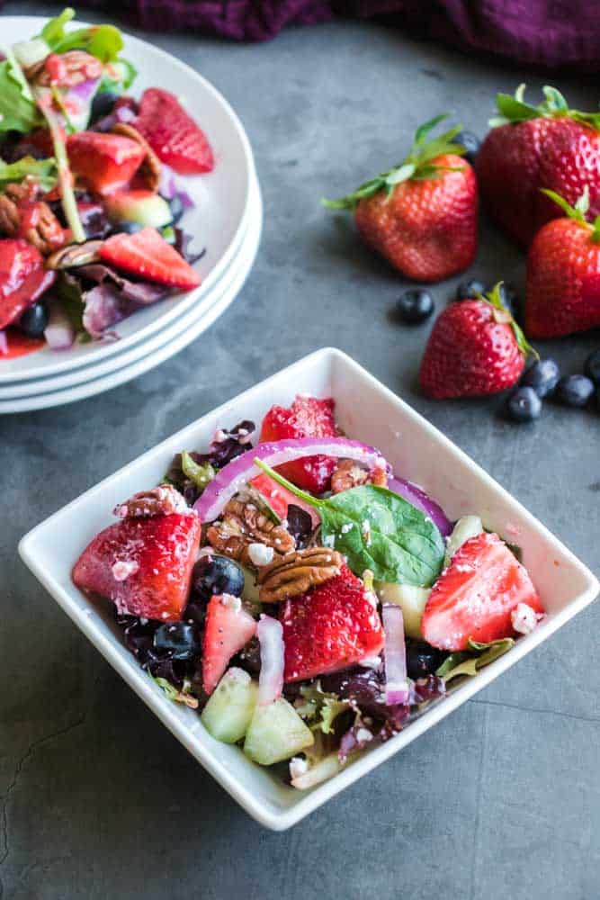 Refreshing Strawberry Salad With Poppy Seed Dressing Recipe - Try this Refreshing Strawberry Salad With Homemade Strawberry Poppy Seed Dressing and you'll be hooked. The flavors are incredible and it's super easy. #strawberry #spinach #easy #poppyseed #dressing #summer #salad #homefreshideas