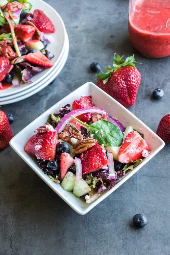 Refreshing Strawberry Salad With Poppy Seed Dressing Recipe - Try this Refreshing Strawberry Salad With Homemade Strawberry Poppy Seed Dressing and you'll be hooked. The flavors are incredible and it's super easy. #strawberry #spinach #easy #poppyseed #dressing #summer #salad #homefreshideas
