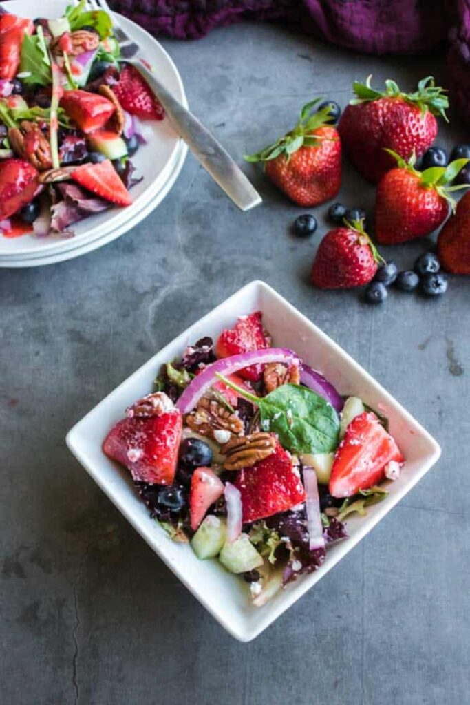 white bowl with strawberry salad