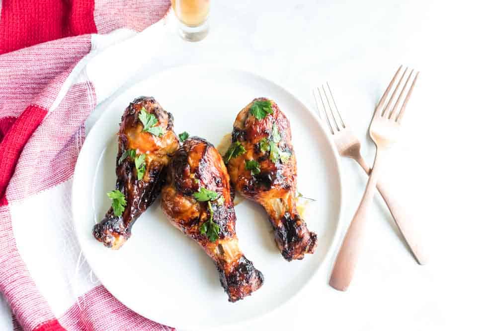 The Best Air Fryer Chicken Drumsticks Recipe - Sink your teeth into the Best Air Fryer Chicken Drumsticks and you won't regret it! They are coated in a Whiskey Barbecue Sauce that's finger-licking good. #chicken #drumsticks #airfryer #easy #under30minutes #dinner #homefreshideas