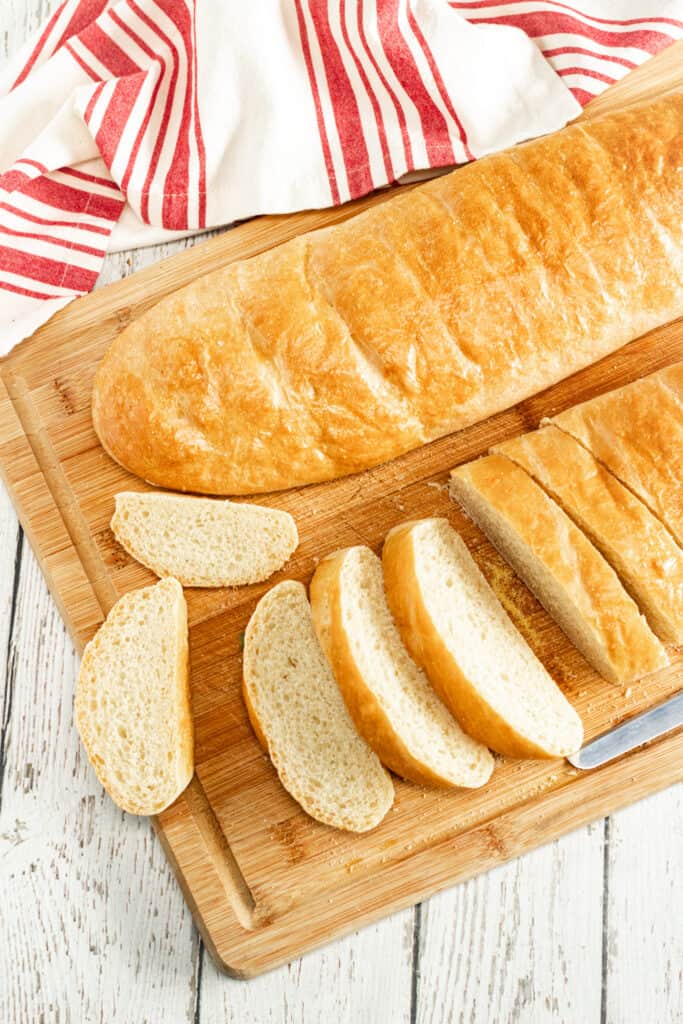 Ultimate Homemade French Bread Recipe - This Ultimate Homemade French Bread Recipe is the perfect side to all your dinners. The bread is soft and it has a flaky crust to die for. #bread #frenchbread #homemade #dinner #side #holiday #homefreshideas
