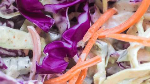 close up of spicy coleslaw in a bowl