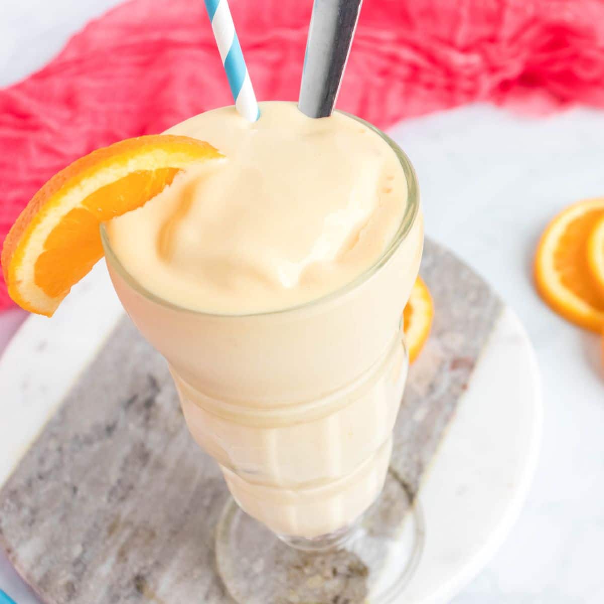 orange creamsicle shake with an orange slice