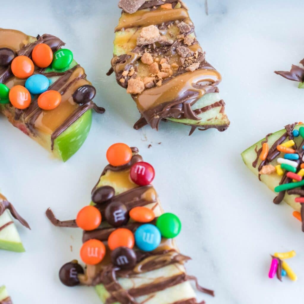 caramel apple slices with candy bits