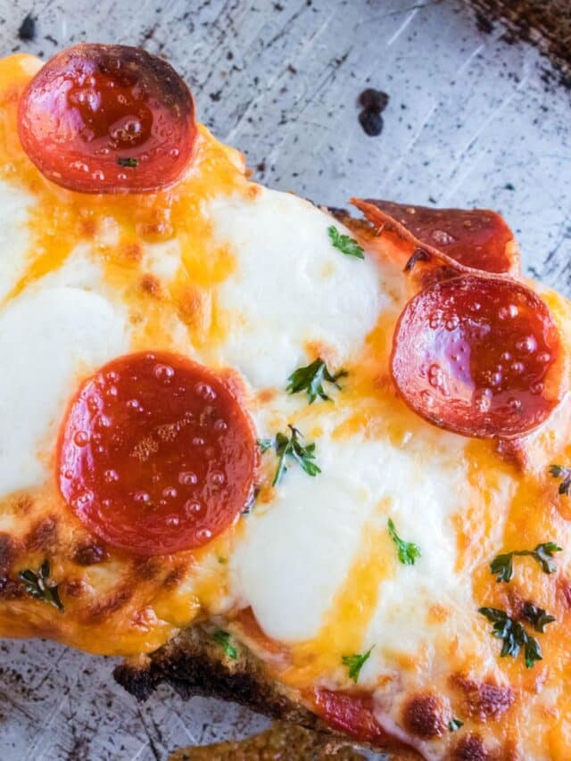 easy french bread pizza ready to be sliced