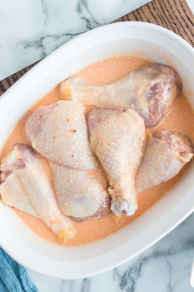 chicken soaking in buttermilk