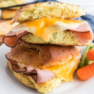 two air fryer ham and cheese sandwiches stacked