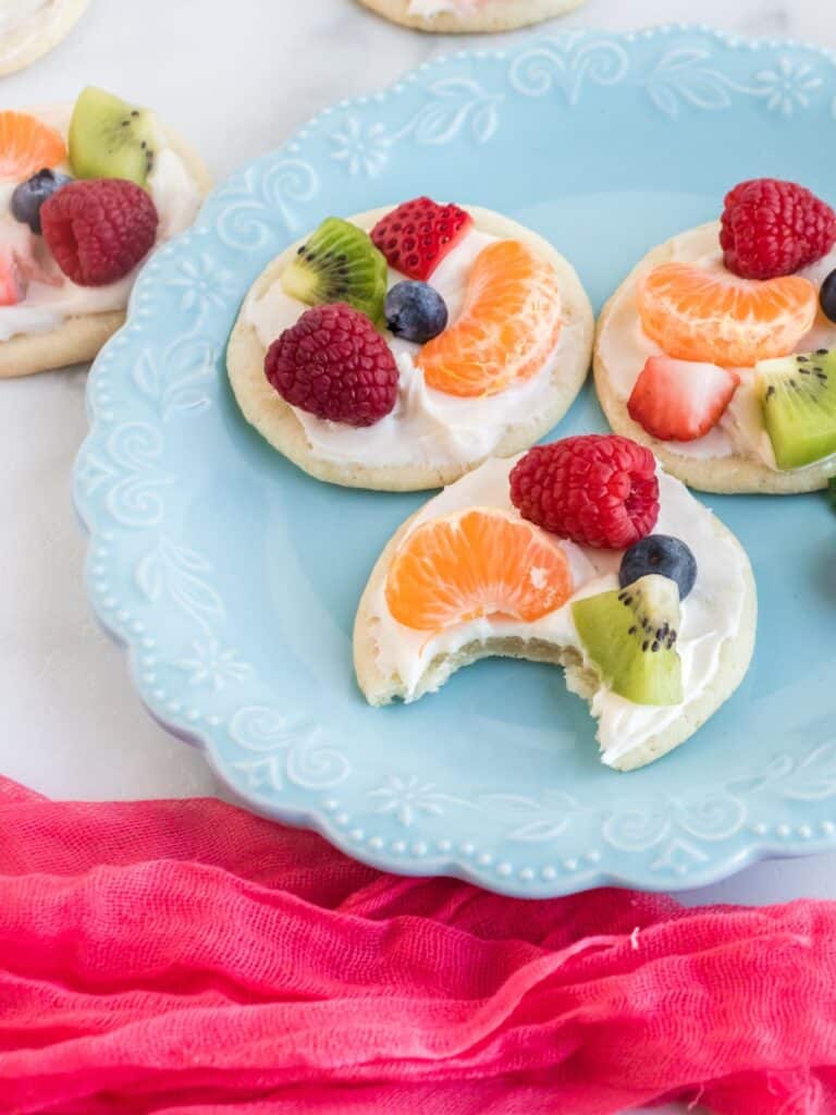 fruit pizza with a bite out of it