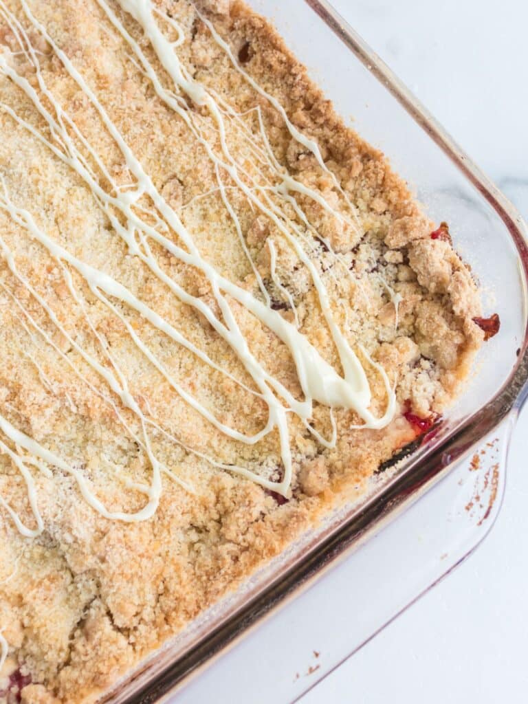 shortbread jam bars in a clear pan