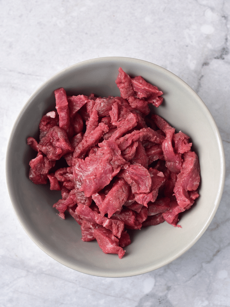 cut steak in bowl